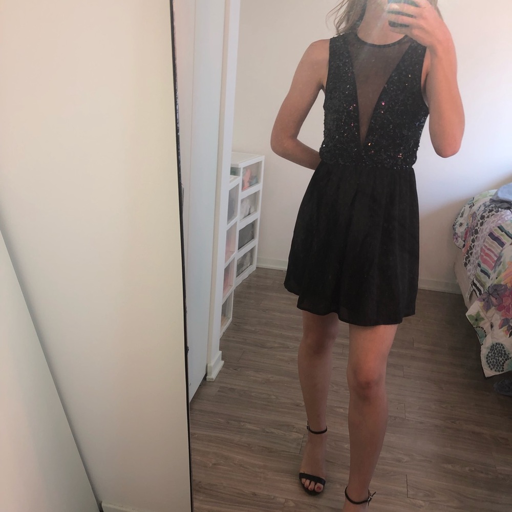 Black dress with sequins and mesh details
